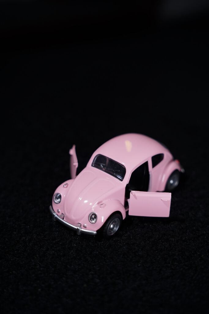 Vintage Pink Volkswagen Beetle Toy Car